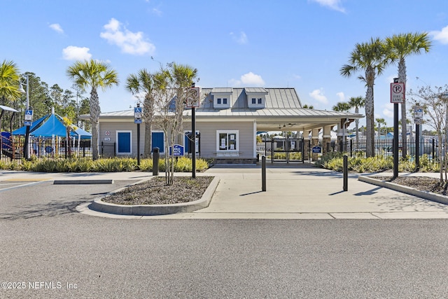 view of building exterior featuring fence