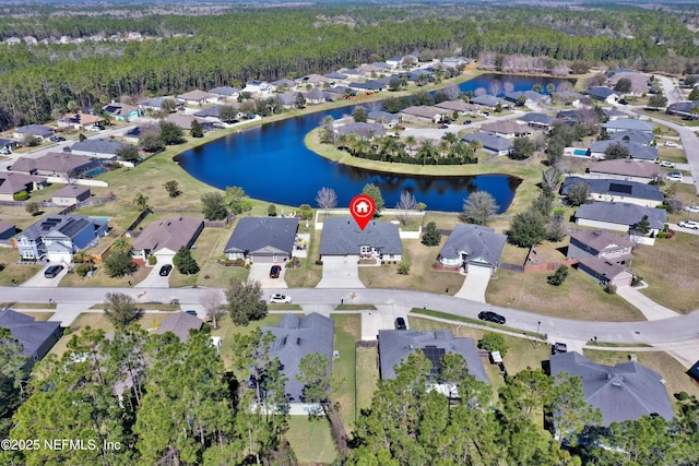 aerial view featuring a water view and a residential view