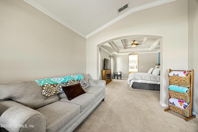 carpeted bedroom with visible vents, arched walkways, lofted ceiling, ornamental molding, and a textured ceiling