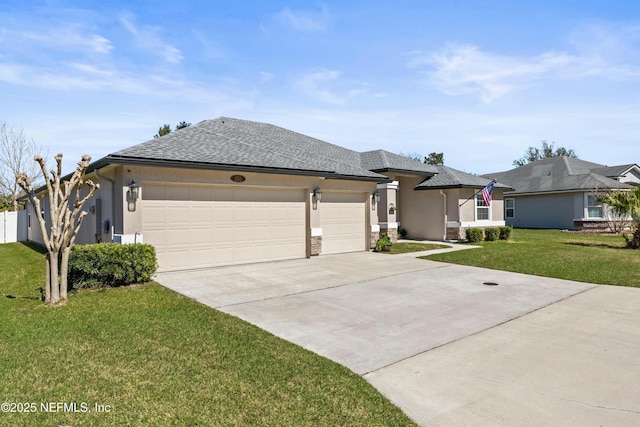 view of front of property featuring driveway, stucco siding, roof with shingles, an attached garage, and a front yard