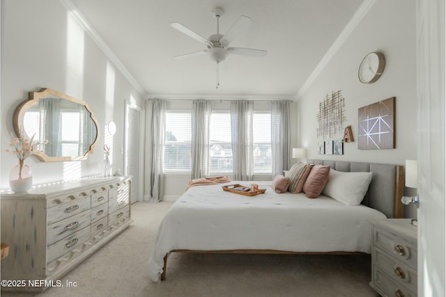 bedroom with a ceiling fan, lofted ceiling, light carpet, and crown molding