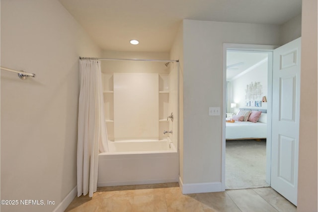 full bathroom featuring tile patterned flooring, shower / bath combo, baseboards, and connected bathroom