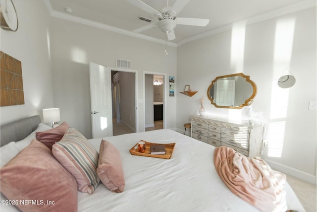 bedroom with ornamental molding, a high ceiling, and visible vents