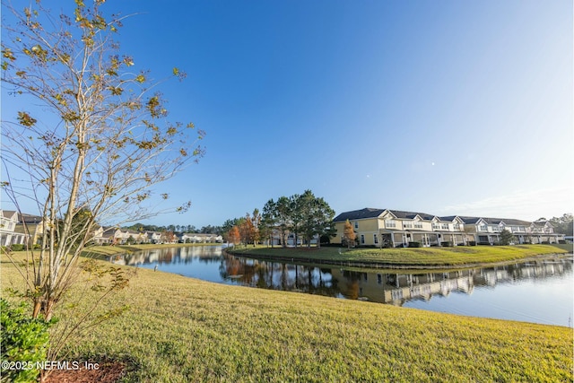 view of water feature with a residential view