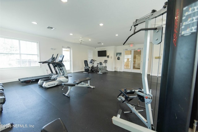 exercise room with recessed lighting, visible vents, and baseboards