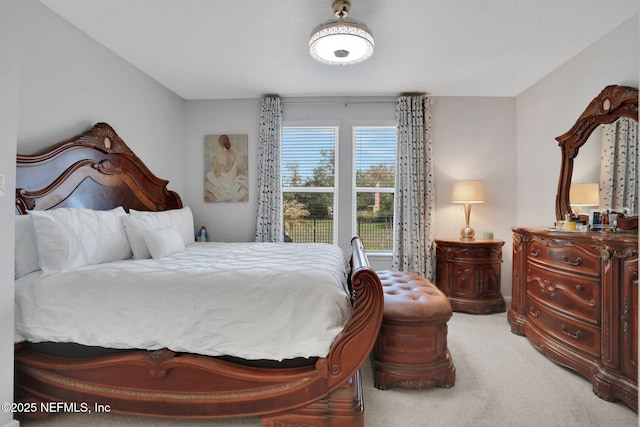 bedroom featuring carpet