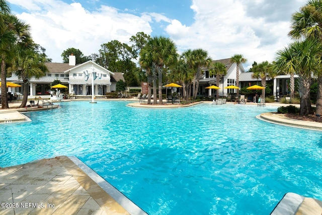 pool with a patio area