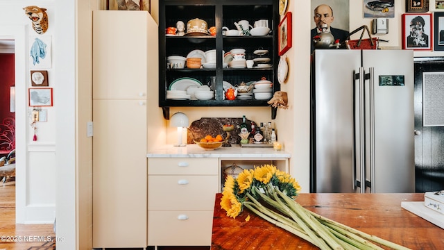 bar featuring high end refrigerator