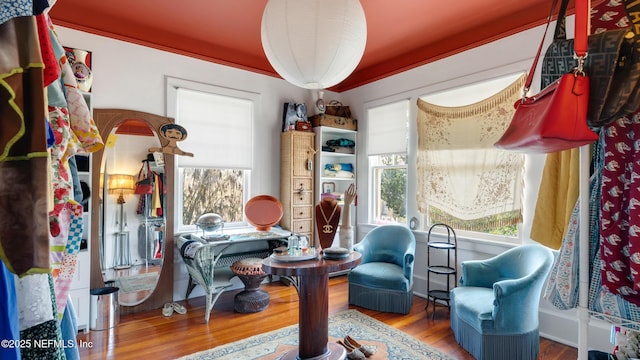 sitting room featuring wood finished floors