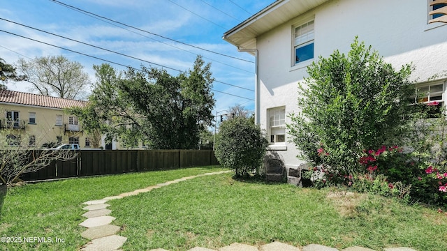 view of yard with fence