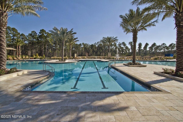 pool featuring a patio