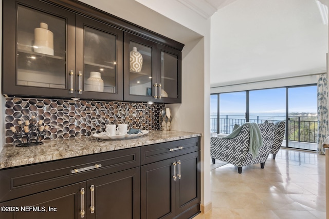 bar featuring decorative backsplash