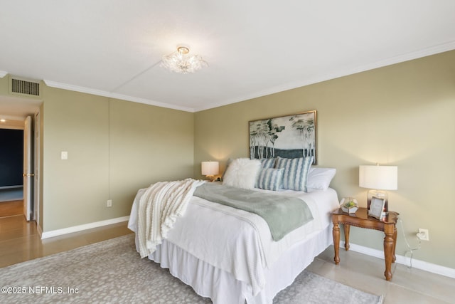 bedroom with baseboards, visible vents, and ornamental molding