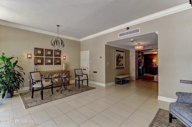 dining room featuring light tile patterned floors, crown molding, visible vents, and baseboards