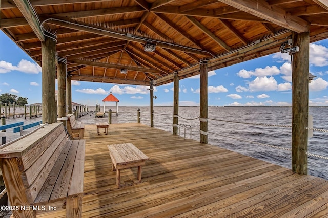 dock area featuring a water view and boat lift