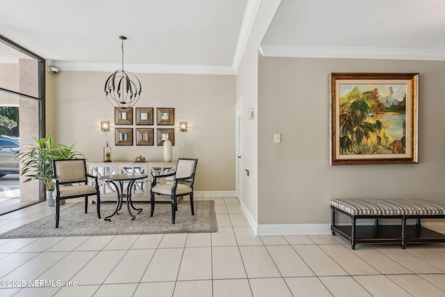 dining area featuring ornamental molding, a notable chandelier, baseboards, and light tile patterned floors