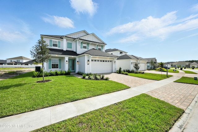 41 Iris Creek Dr, Saint Augustine, FL 32092 - traditional-style house featuring driveway, board and batten siding, an attached garage, and a front lawn