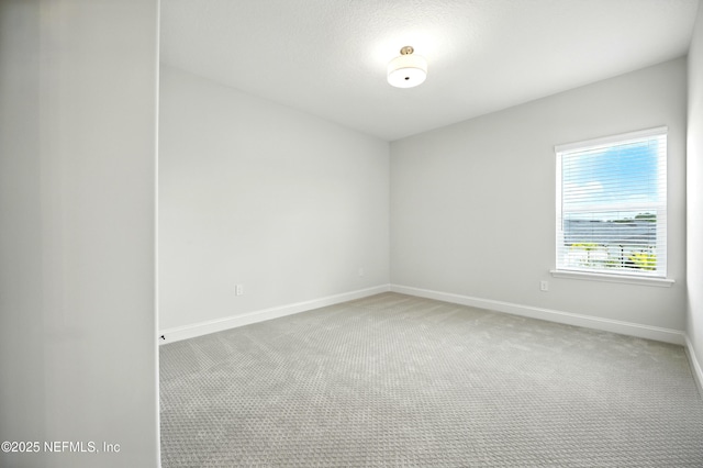 41 Iris Creek Dr, Saint Augustine, FL 32092 - spare room featuring light colored carpet and baseboards