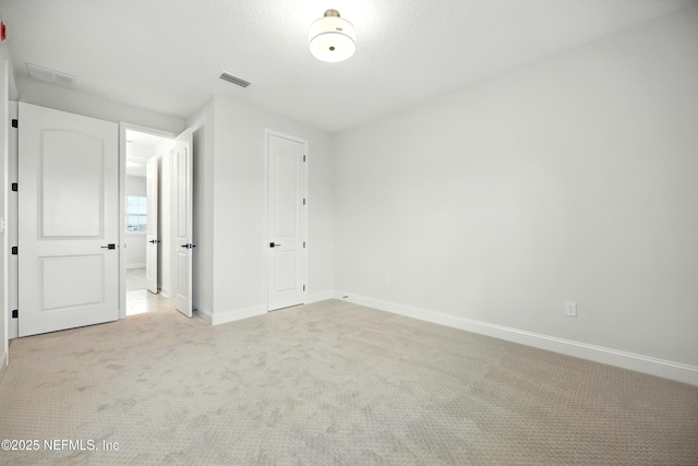41 Iris Creek Dr, Saint Augustine, FL 32092 - unfurnished bedroom featuring light carpet and a closet