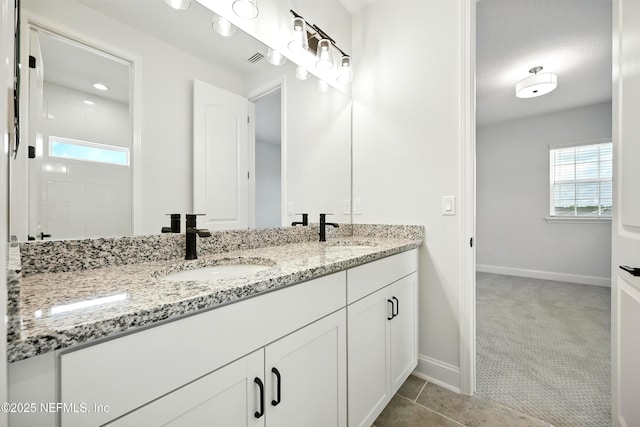 41 Iris Creek Dr, Saint Augustine, FL 32092 - full bath with double vanity, tiled shower, and tile patterned floors