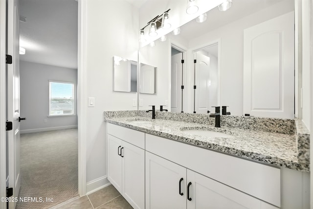 41 Iris Creek Dr, Saint Augustine, FL 32092 - full bath featuring double vanity and tile patterned floors