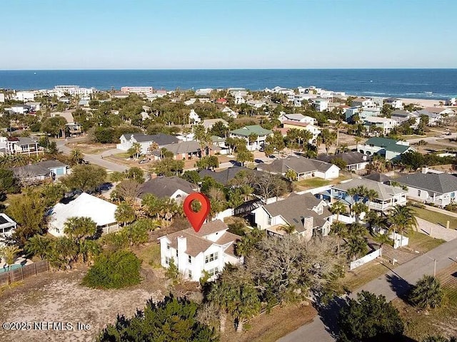 bird's eye view with a residential view and a water view