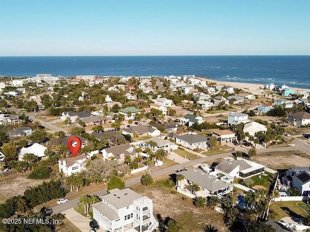 bird's eye view with a water view and a residential view