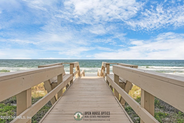 view of home's community with a view of the beach and a water view