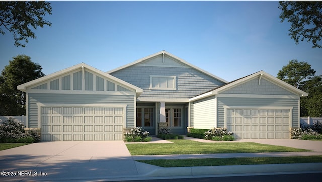 craftsman-style house featuring a garage and driveway