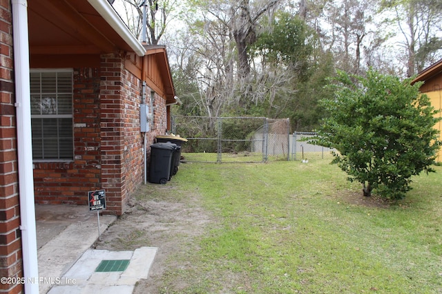 view of yard featuring fence