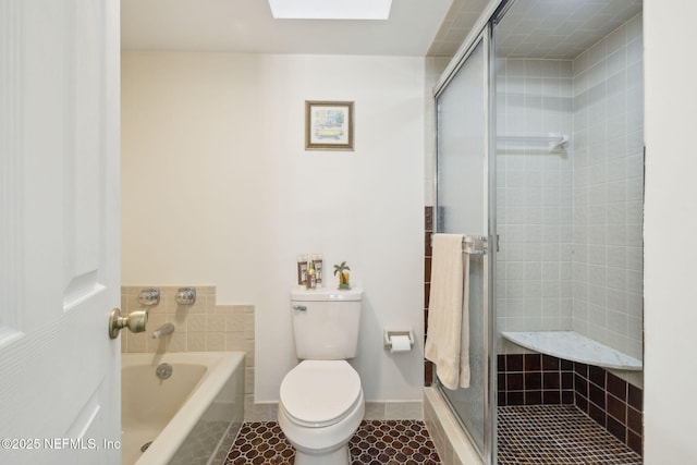 bathroom featuring a garden tub, toilet, a shower stall, baseboards, and tile patterned floors