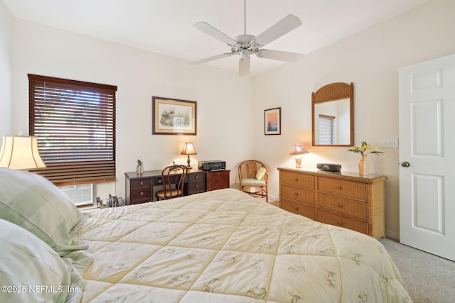 carpeted bedroom with a ceiling fan