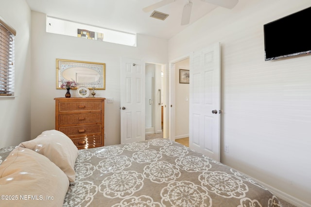 bedroom featuring ceiling fan and visible vents