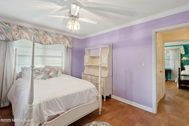 bedroom featuring ceiling fan, baseboards, and ornamental molding