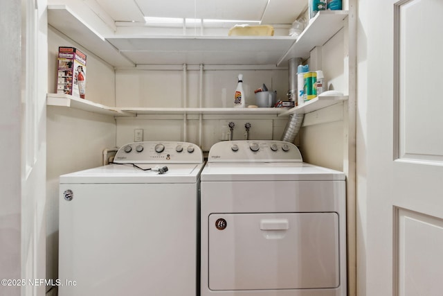 washroom featuring laundry area and independent washer and dryer