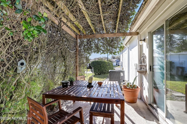 exterior space with outdoor dining area and central air condition unit