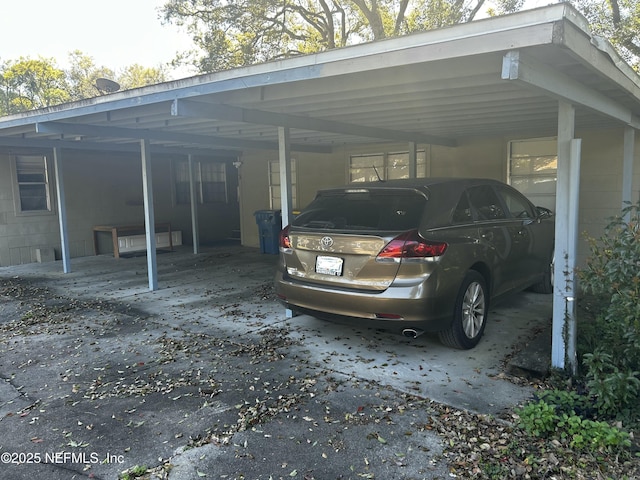 view of parking with a carport