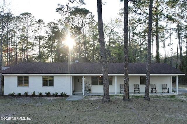 ranch-style home with brick siding