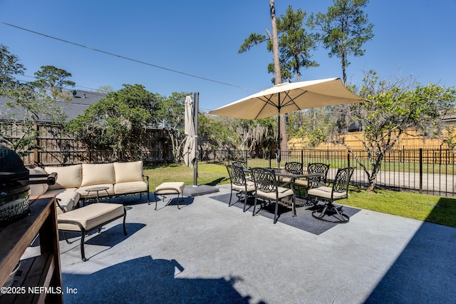 view of patio featuring outdoor dining area, a fenced backyard, and an outdoor hangout area