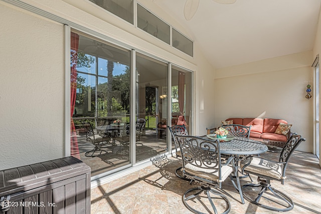 sunroom with lofted ceiling