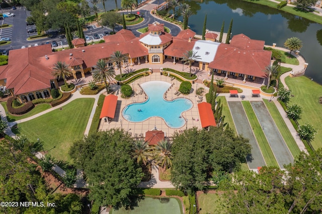 drone / aerial view with a water view