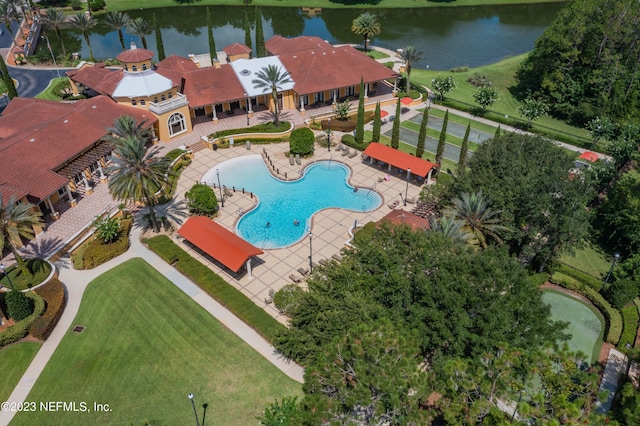 birds eye view of property featuring a water view