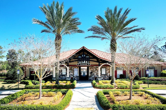 view of property featuring driveway