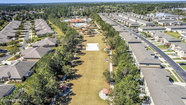 birds eye view of property with a residential view