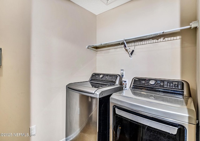 laundry room featuring laundry area and washer and dryer