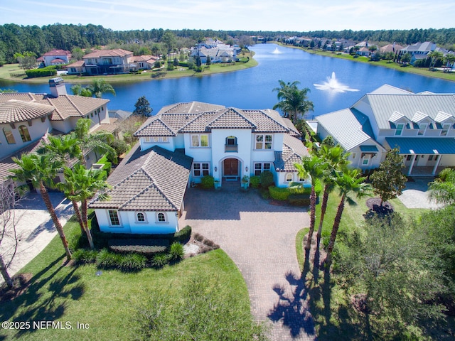 aerial view with a water view and a residential view