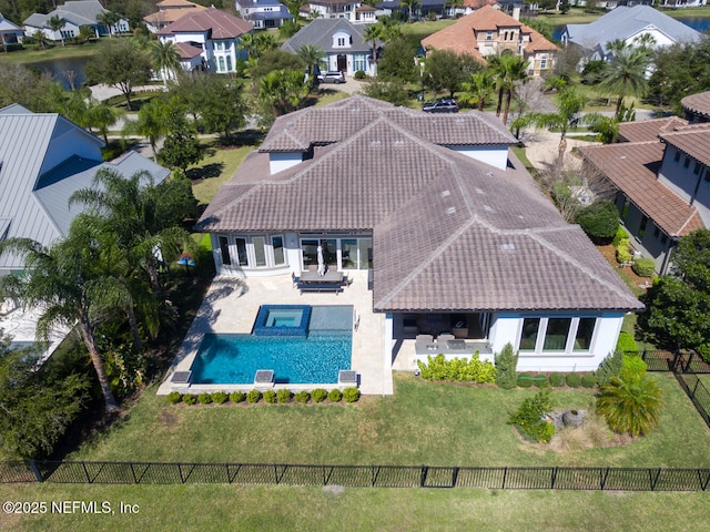 drone / aerial view with a residential view