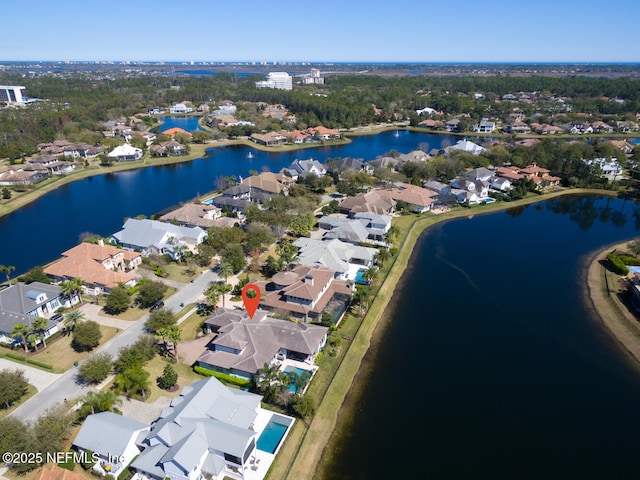 bird's eye view with a water view and a residential view