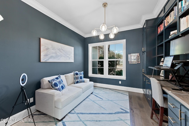 home office featuring an inviting chandelier, crown molding, baseboards, and wood finished floors