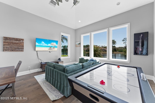 game room featuring dark wood-type flooring, recessed lighting, visible vents, and baseboards